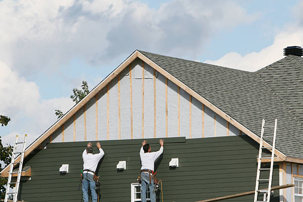 Professional Siding technician working in Boonville, IN